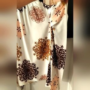 white long sleeve shirt with brown and pink designs